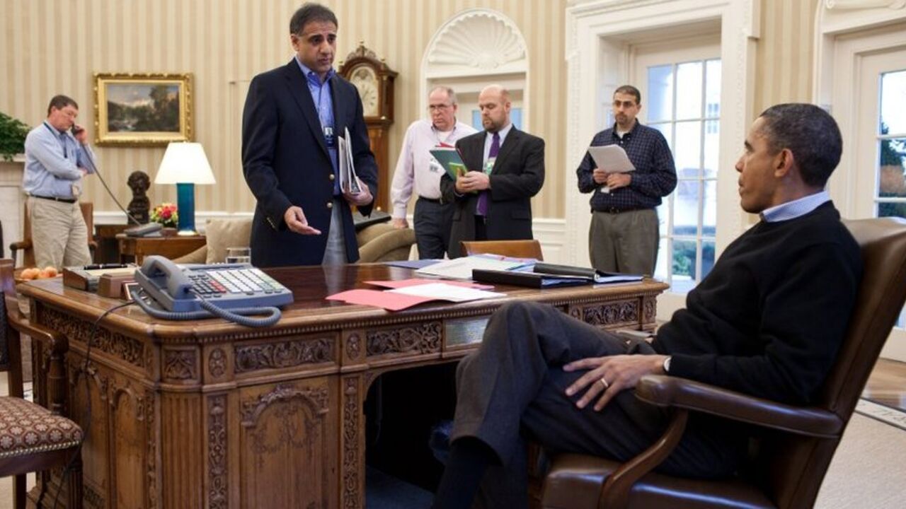 President Barack Obama is briefed by Puneet Talwar, Senior Director for Iraq, Iran and the Gulf States, in the Oval Office, Saturday, Feb. 5, 2011. (Official White House Photo by Pete Souza)

This official White House photograph is being made available only for publication by news organizations and/or for personal use printing by the subject(s) of the photograph. The photograph may not be manipulated in any way and may not be used in commercial or political materials, advertisements, emails, products, promo