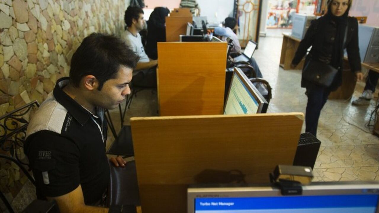 Customers use computers at an internet cafe in Tehran May 9, 2011. Websites like Facebook, Twitter, YouTube and countless others were banned shortly after the re-election of Iran's President Mahmoud Ahmadinejad and the huge street protests that followed. Seen by the government as part of a "soft war" waged by the enemies of the Islamic Republic, social networking and picture sharing sites were a vital communication tool for the anti-Ahmadinejad opposition -- more than a year before they played a similar rol