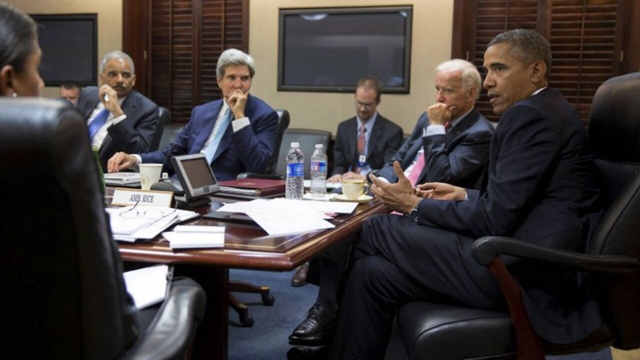 U.S. President Barack Obama (R) meets with his national security staff to discuss the situation in Syria in the Situation Room of the White House in Washington, in this photo taken August 30, 2013, courtesy of the White House. Others in the picture include (from L-R) National Security Advisor Susan Rice, Attorney General Eric Holder, Secretary of State John Kerry and Vice President Joe Biden. Obama's top advisers were to make their case for limited military strikes against Syria to the full Senate on Saturd