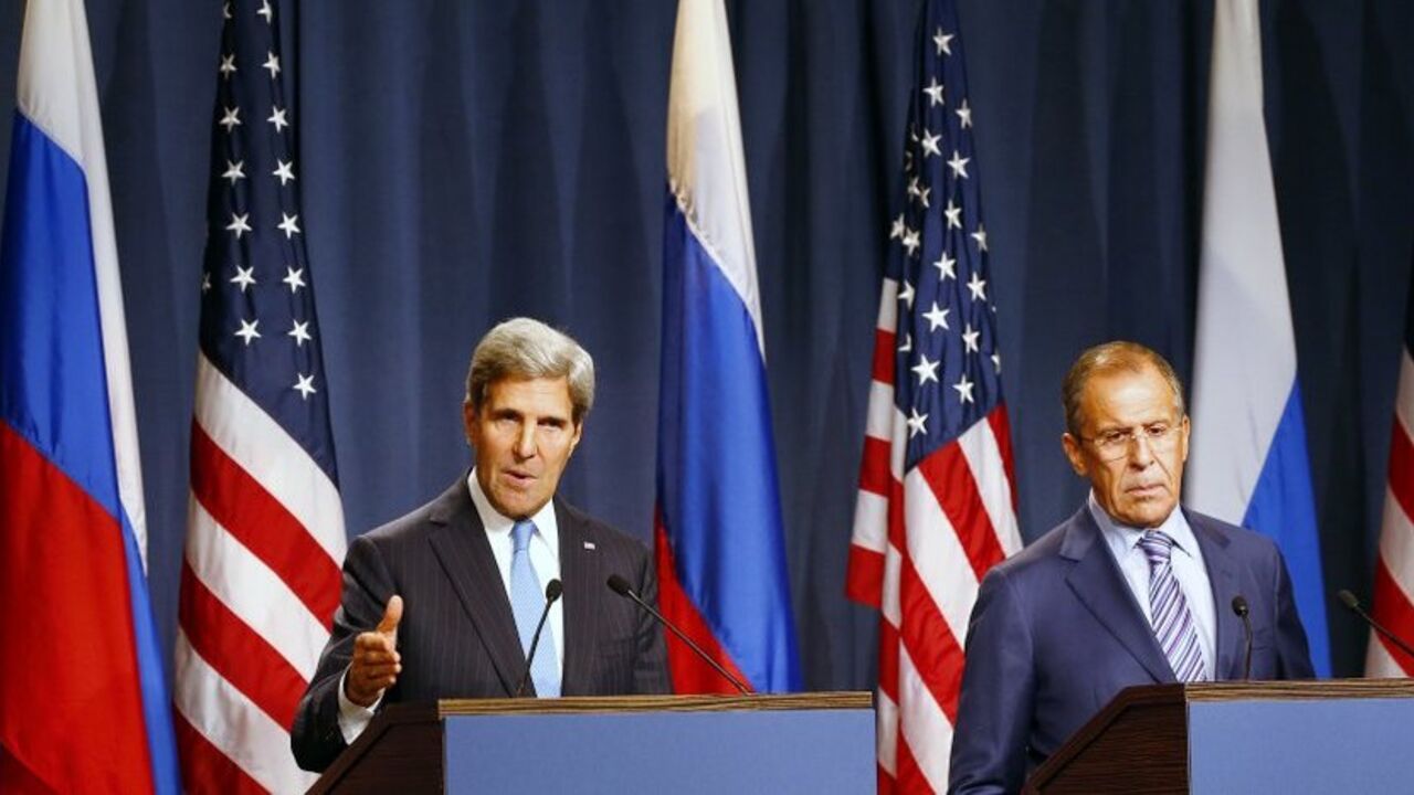 Russia's Foreign Minister Sergey Lavrov (R) and U.S. Secretary of State John Kerry hold a news conference at a hotel in Geneva September 12, 2013. Kerry flew into Geneva on Thursday to hear Russia's plans to disarm Syria of its chemical weapons and avert U.S.-led military strikes, an initiative that has transformed diplomacy in the two-and-a-half year old civil war. REUTERS/Ruben Sprich (SWITZERLAND - Tags: POLITICS) - RTX13J2W