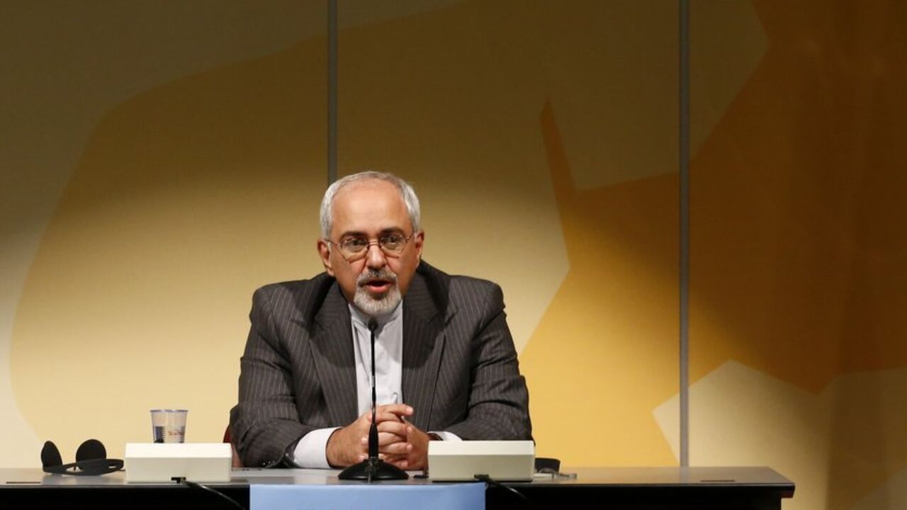 Iranian Foreign Minister Mohammad Javad Zarif addresses a news conference following nuclear negotiations with European Union's foreign policy chief Catherine Ashton, who is leading talks with Iran on behalf of the six world powers, at the United Nations in Geneva October 16, 2013. Iran called two days of nuclear talks with six world powers, United States, Russia, France, Britain, Germany and China, that ended on Wednesday "fruitful" and said it hoped for a new phase in relations. He said two sides had for t