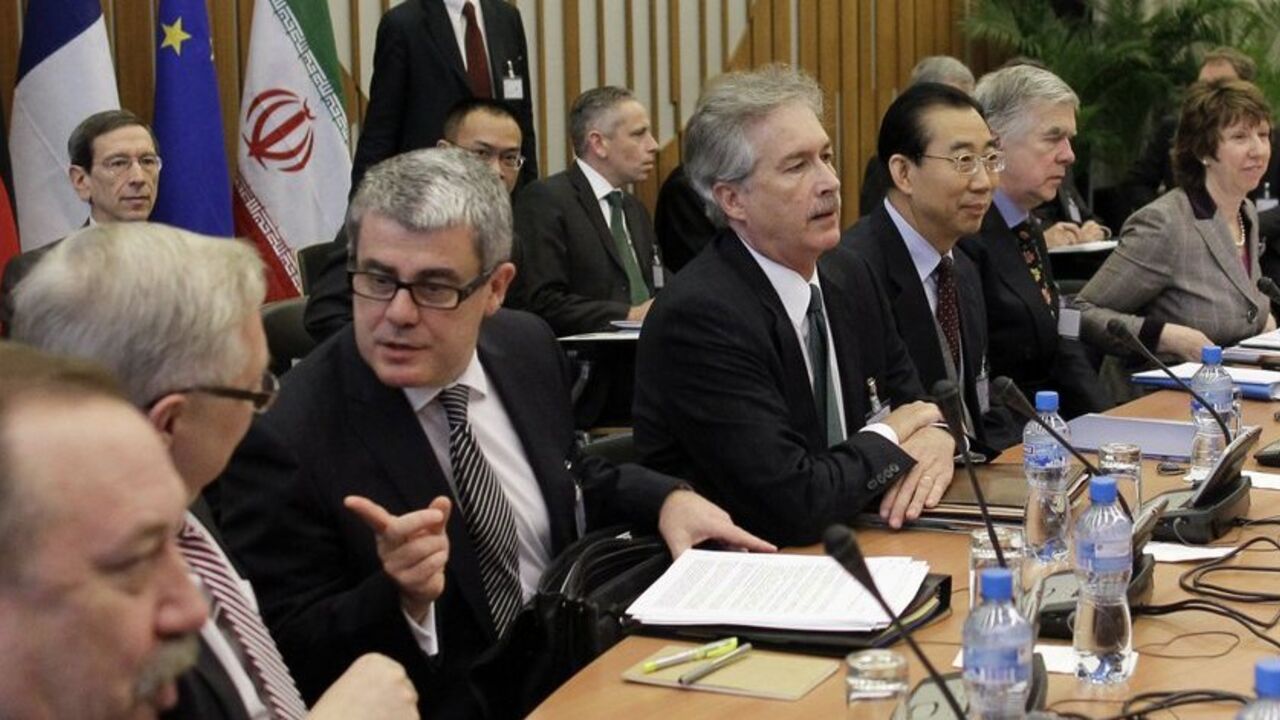 Jacques Audibert, General and Stategic Affairs director of France (3rd L) talks to Russia's Deputy Foreign Minister  Sergey Ryabkov (2nd L) as U.S. ambassador William Burns (C) Chinese assistant Foreign Minister Hailong Wu, European political adviser Robert Cooper from Britain and EU foreign policy chief Catherine Ashton (4th L-R) arrive for a meeting at the conference centre near the Swiss mission to the United Nations in Geneva, December 6, 2010. Six world powers began their first talks with Iran in more 