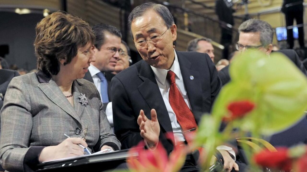 European Union's foreign policy chief Catherine Ashton talks with U.N. Secretary-General Ban Ki-moon on the sidelines at the 47th International Conference on Security Policy in the hotel 'Bayerischer Hof' in Munich, February 5, 2011.    REUTERS/Jens Meyer/Pool   (GERMANY - Tags: POLITICS MILITARY) - RTXXHKZ