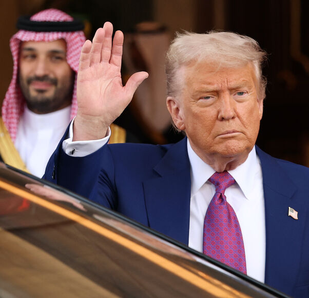 US President Donald J. Trump leaves the Saudi Royal Court with Saudi Crown Prince Mohammed bin Salman on May 13, 2025, in Riyadh, Saudi Arabia. 