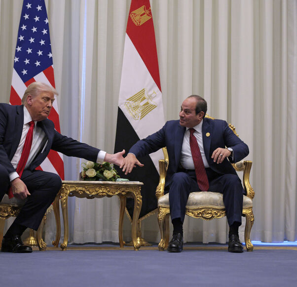SHARM EL-SHEIKH, EGYPT - OCTOBER 13: U.S. President Donald Trump and President of Egypt Abdel Fattah El-Sisi clasp hands as they speak to the press before their meeting on October 13, 2025 in Sharm El-Sheikh, Egypt. President Trump is in Egypt to meet with European and Middle Eastern leaders in what’s being billed as an international peace summit, following the start of a US-brokered ceasefire deal to end the war in the Gaza Strip. (Photo by Chip Somodevilla/Getty Images)