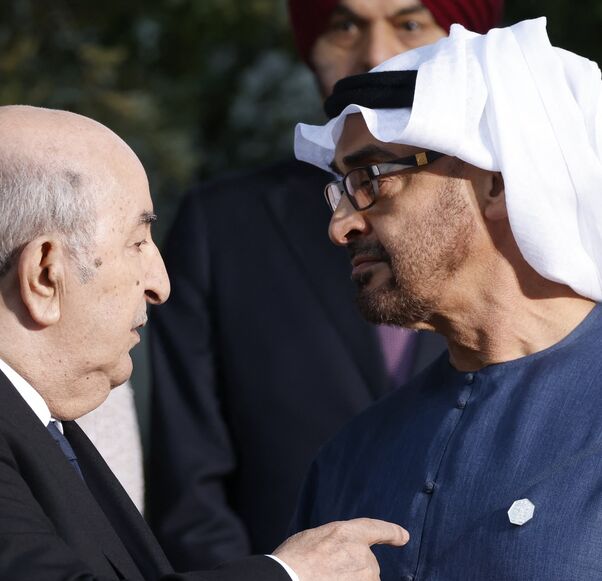 Algeria's President Abdelmadjid Tebboune (L) speaks with UAE President Sheikh Mohamed bin Zayed during the G7 Summit hosted by Italy, in Savelletri, on June 14, 2024.