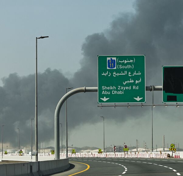 A plume of smoke rises from the port of Jebel Ali following a reported Iranian strike in Dubai on March 1, 2026. 