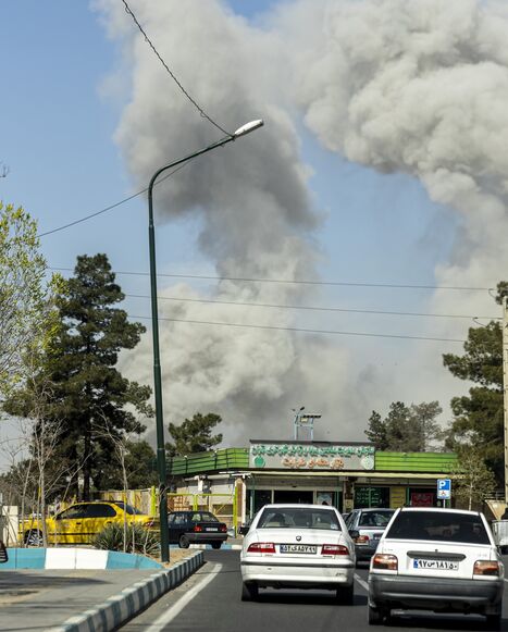 Plumes of smoke rise following an explosion on March 5, 2026, in Tehran, Iran.