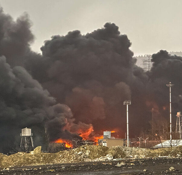 Smoke and flames rise at the site of airstrikes on an oil depot, Tehran, Iran, March 8, 2026.