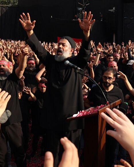 Mahmoud Karimi, a maddah, leads a mourning ritual during the Muslim month of Muharram in the lead-up to Ashura, a 10-day period commemorating the seventh century killing of Prophet Mohammed's grandson Imam Hussein in Tehran on July 3, 2025.