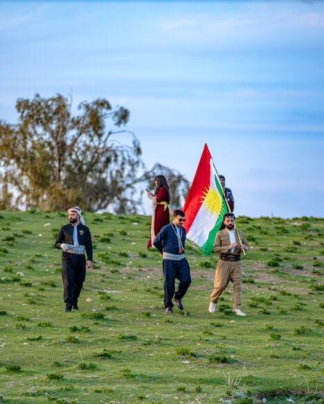 Kurdish people waving Kurdistan flags gather to celebrate Nowruz on the hill of Urkesh in the countryside of Amuda in northeastern Syria on March 18, 2026. Nowruz, meaning "new day," is an ancient festival that marks the start of spring and the new year on the vernal equinox, which usually falls on March 20 or 21. It is celebrated by more than 300 million people worldwide and has been observed for over 3,000 years across regions including the Middle East, Central Asia, the Caucasus and parts of Eastern Euro