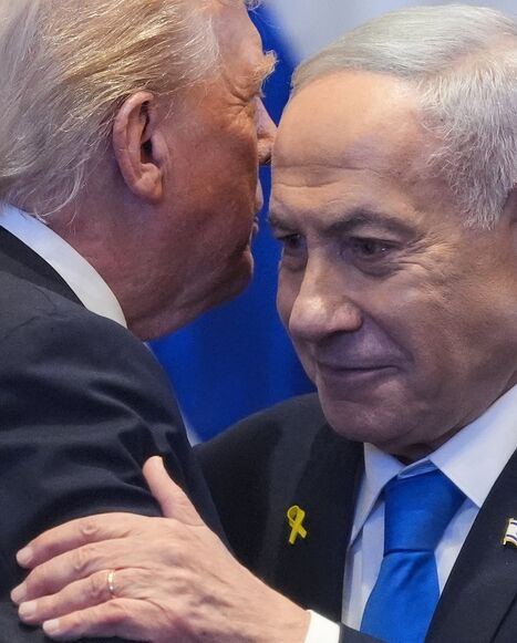US President Donald Trump talks with Israeli Prime Minister Benjamin Netanyahu in the Knesset, Jerusalem, Oct. 13, 2025.