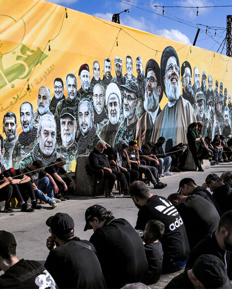 Shia Muslim devotees gather for a mourning ritual near the shrine of Hassan Nasrallah, the slain leader of the Lebanese Shia movement Hezbollah who was killed in a 2024 Israeli-airstrike, in Beirut's southern suburbs on June 26, 2026 at the peak of Ashura, a 10-day period commemorating the seventh century killing of Prophet Mohammed's grandson Imam Hussein. (Photo by JOSEPH EID / AFP via Getty Images)