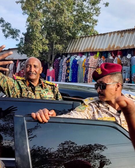 Sudan's de facto leader and armed forces chief Abdel Fattah al-Burhan greets supporters in Port Sudan, Dec. 29, 2024.