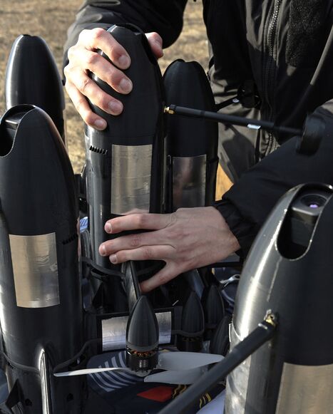 An employee of the Ukrainian SkyFall company checks a P1-Sun interceptor drone before a test flight at an undisclosed location in Ukraine on March 19, 2026,