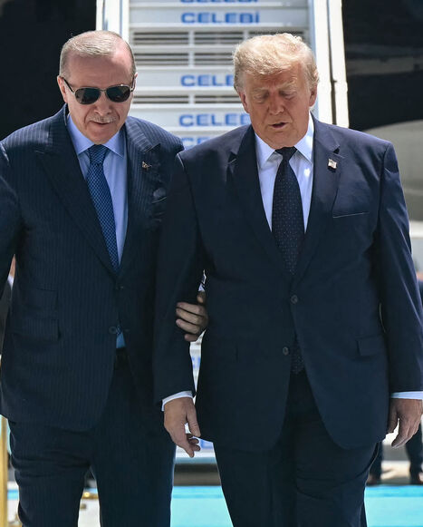 Turkish President Recep Tayyip Erdogan (L) welcomes US President Donald Trump (R) upon his arrival on Air Force One at Etimesgut Air Base near Ankara, on July 7, 2026, before attending the 36th NATO Heads of State and Government Summit. (Photo by SAUL LOEB / AFP via Getty Images)