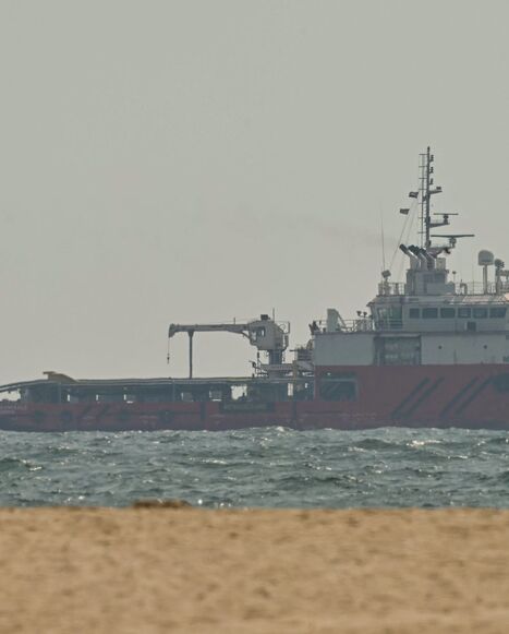 A ship sails off the coast of Ajman on July 10, 2026. 