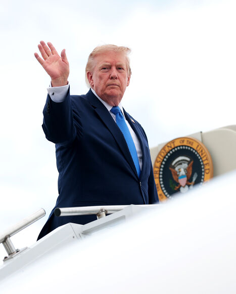 President Donald Trump waves as he boards Air Force One at Morristown Municipal Airport on Aug. 2, 2026 in Morristown, New Jersey. 