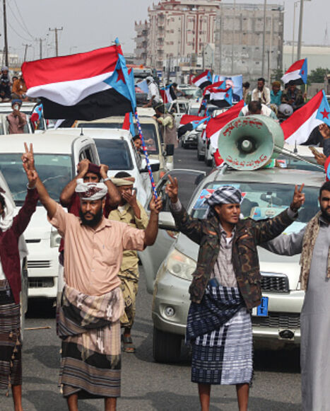 Yemenis gather during a rally to show their support for the UAE-backed Southern Transitional Council (STC) in the coastal port city of Aden, on December 14, 2025. (Saleh Al-OBEIDI / AFP via Getty Images)