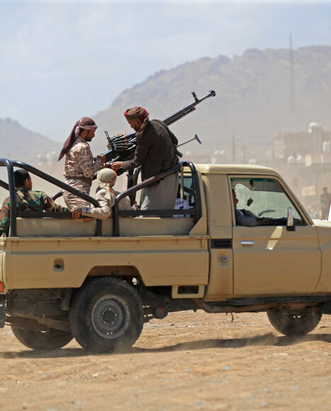 Supporters of the Iran-backed Houthi movement, arrive with their weapons to rally in solidarity with Iran and Lebanon, in Sanaa on April 8, 2026, following the announcement of a ceasefire in the Middle East war.  