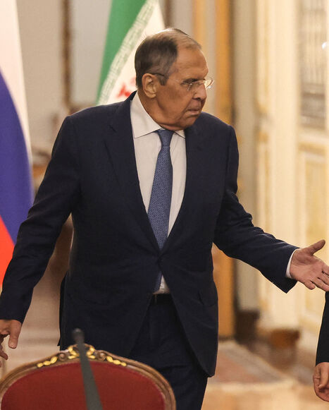 Russia's Foreign Minister Sergey Lavrov (L) and Iran's Foreign Minister Abbas Araghchi arrive to hold a press conference after a meeting in Tehran on October 19, 2026. The Russian foreign minister arrived in Iran on October 19, in his first visit since the outbreak of the Middle East war as Moscow seeks to play a mediating role. (Photo by ATTA KENARE / AFP via Getty Images)