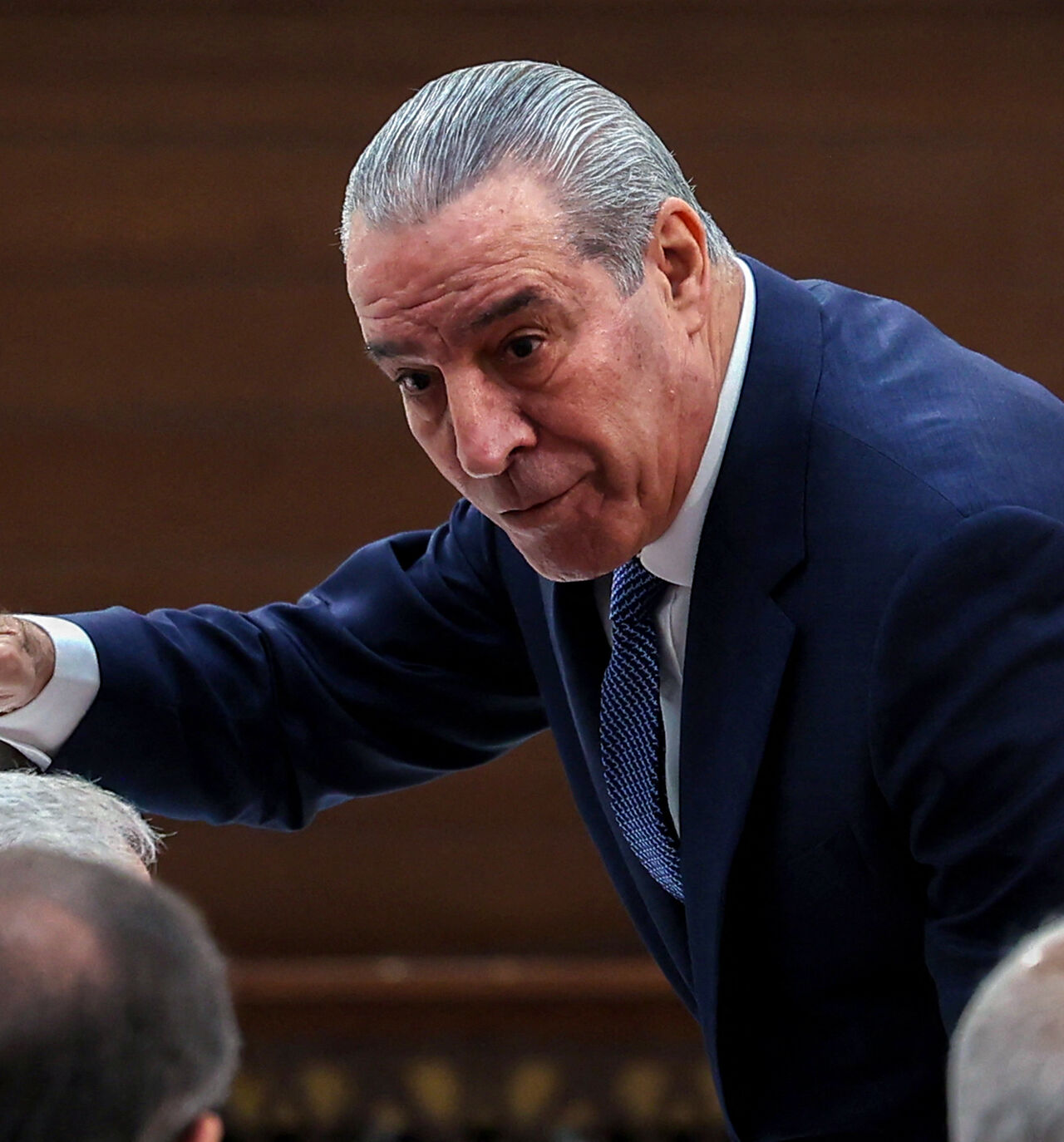 Secretary General of the Executive Committee of the Palestine Liberation Organization (PLO), Hussein al-Sheikh, gestures as he arrives for the 32nd Palestinian Liberation Organization (PLO) Central Council session in Ramallah on April 23, 2025. Palestinian president Mahmud Abbas on April 23 urged Hamas to free all hostages in Gaza, saying their captivity provided Israel with "excuses" to attack the territory, as rescuers recovered charred bodies from an Israeli strike. (Photo by Zain JAAFAR / AFP) (Photo by
