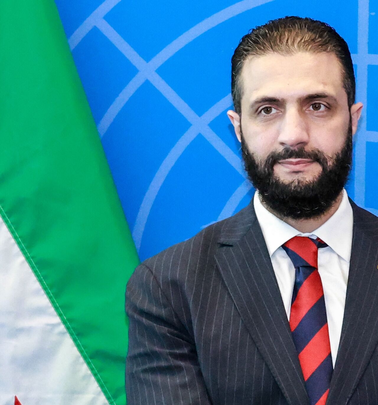 Syrian President Ahmed al-Sharaa visits with UN Secretary-General Antonio Guterres (off frame) during the United Nations General Assembly at the UN headquarters in New York City on Sept. 24, 2025.