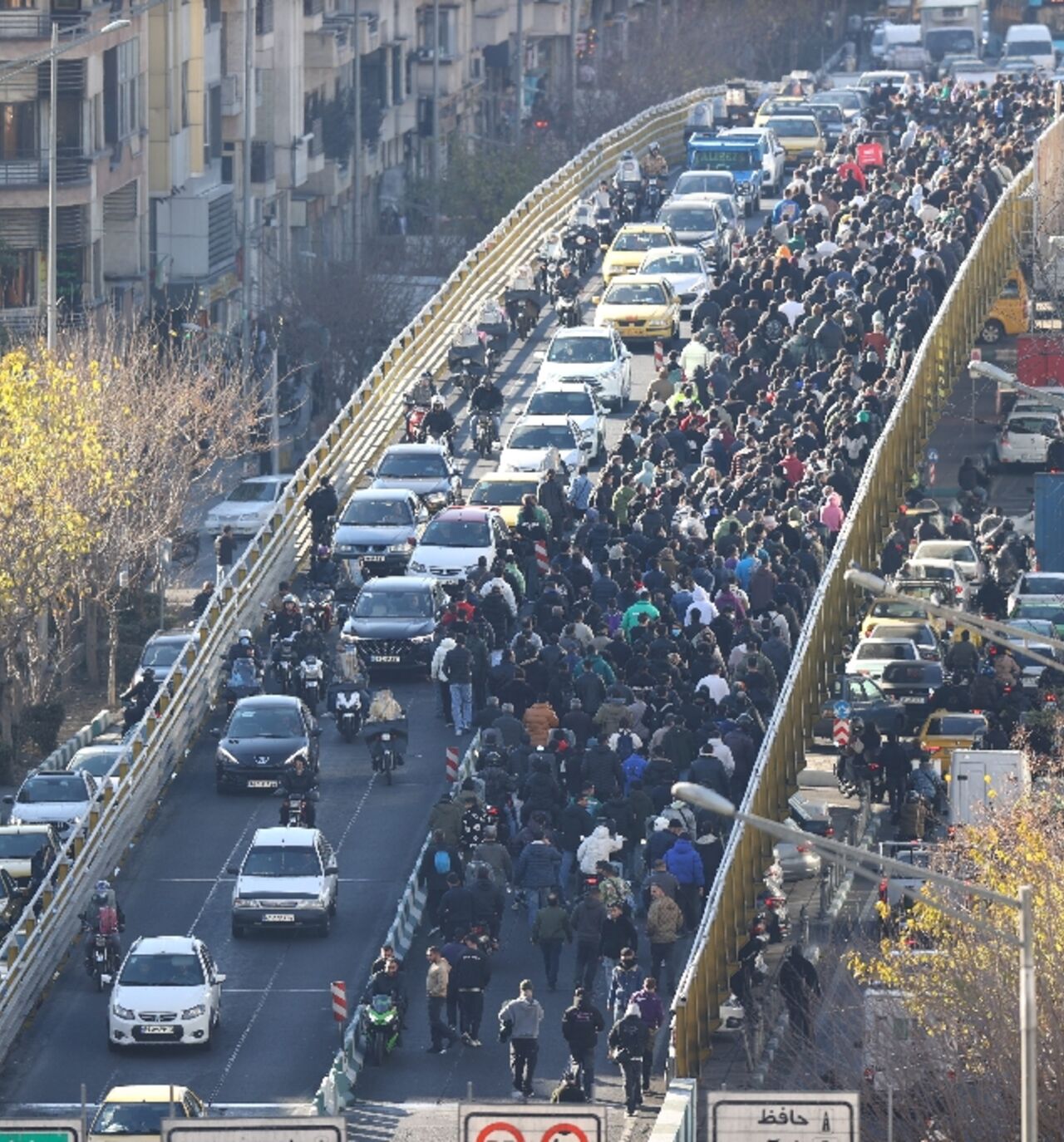 Shopkeepers and traders in Tehran protest against the economic hardships and sharp swings in Iran's embattled currency