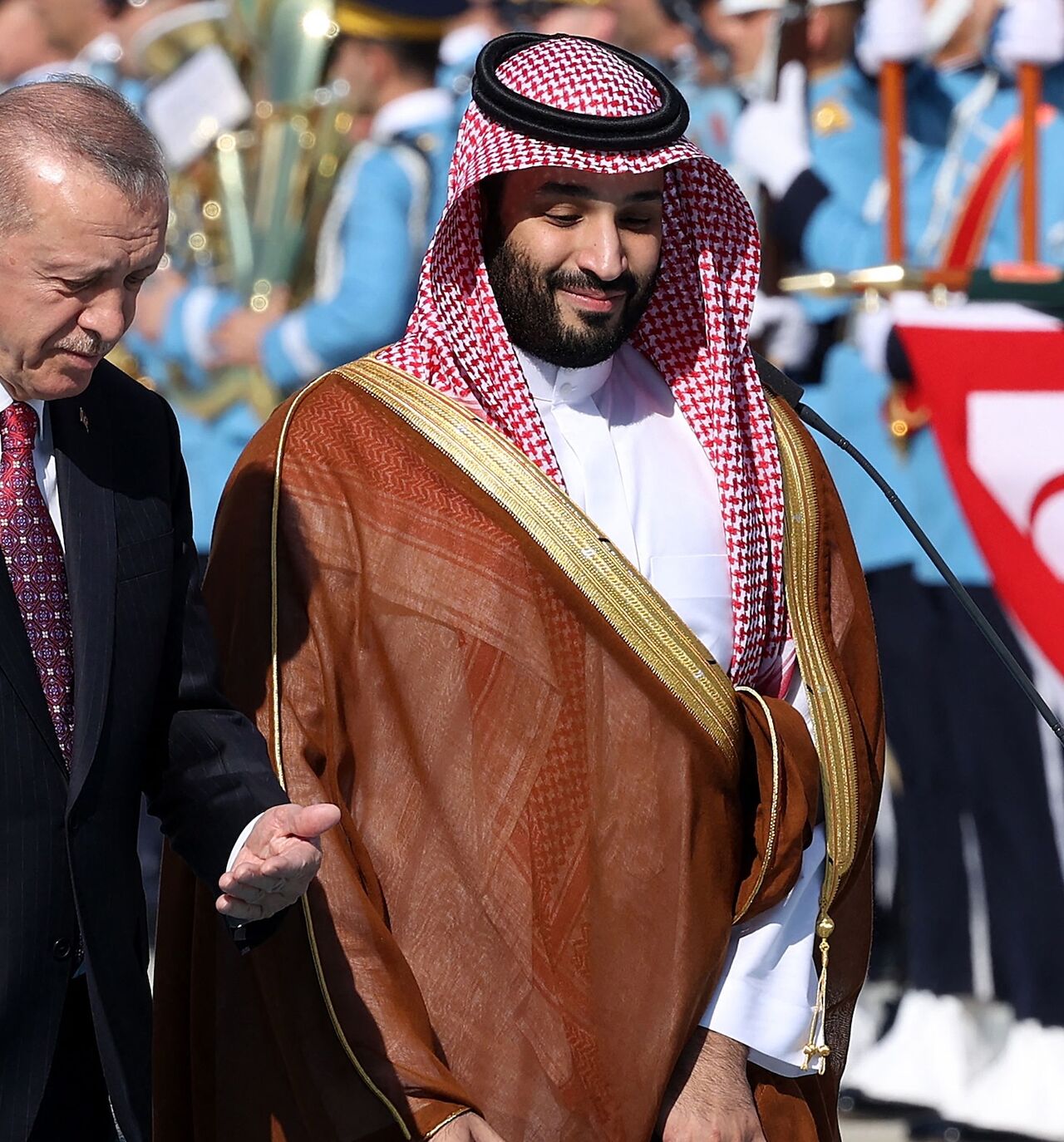 Turkish President Recep Tayyip Erdogan (L) gestures as he welcomes Crown Prince of Saudi Arabia Mohammed bin Salman (R) during an official ceremony at the Presidential Complex in Ankara, on June 22, 2022.