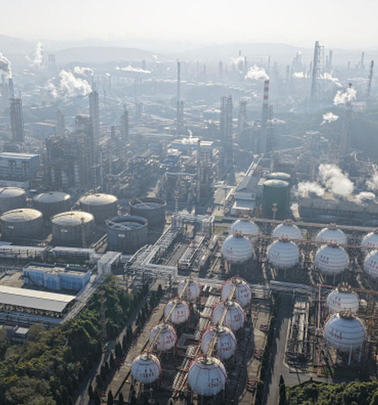 An aerial view shows a petrochemical plant in operation by the Yangtze River in Nanjing, in eastern China's Jiangsu province November 26, 2025. (Photo by CN-STR / AFP via Getty Images) / China OUT