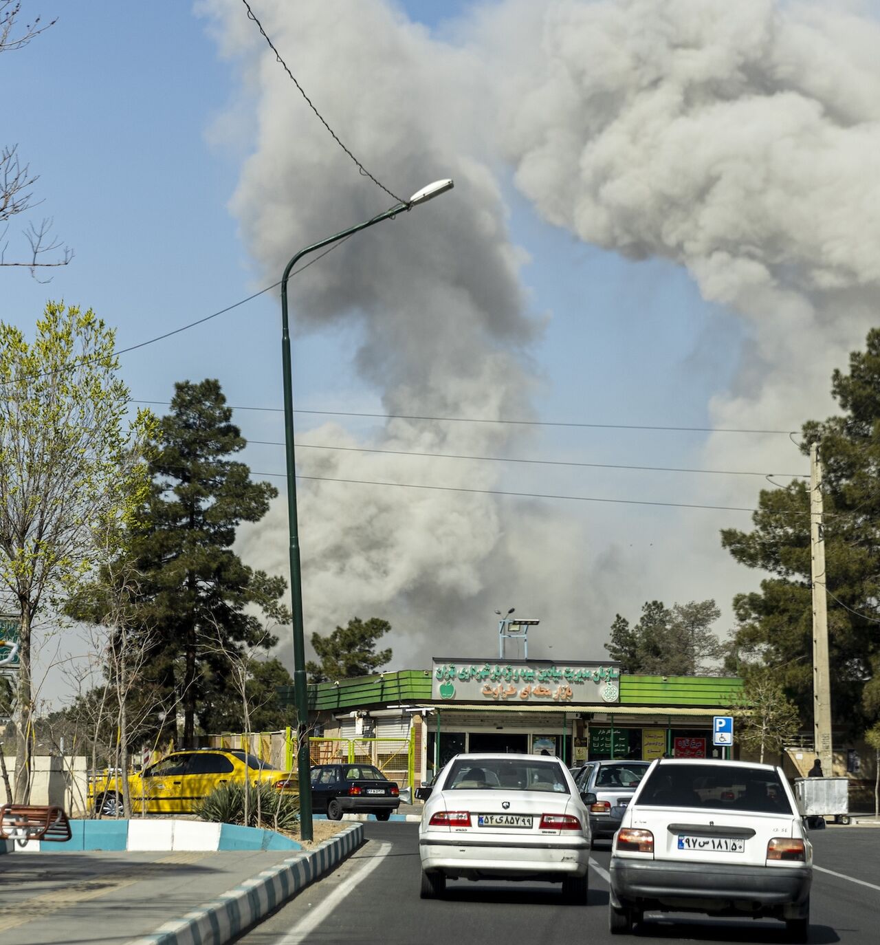 Plumes of smoke rise following an explosion on March 5, 2026, in Tehran, Iran.