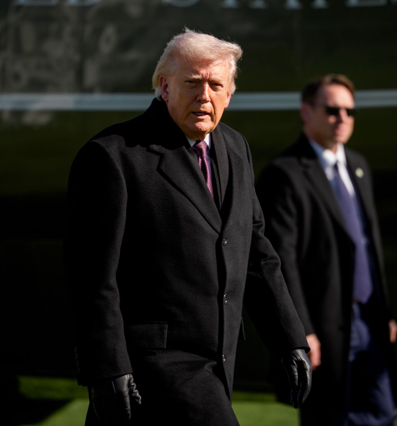 US President Donald Trump steps of Marine One as he returns to the White House on March 18, 2026, in Washington, DC. 