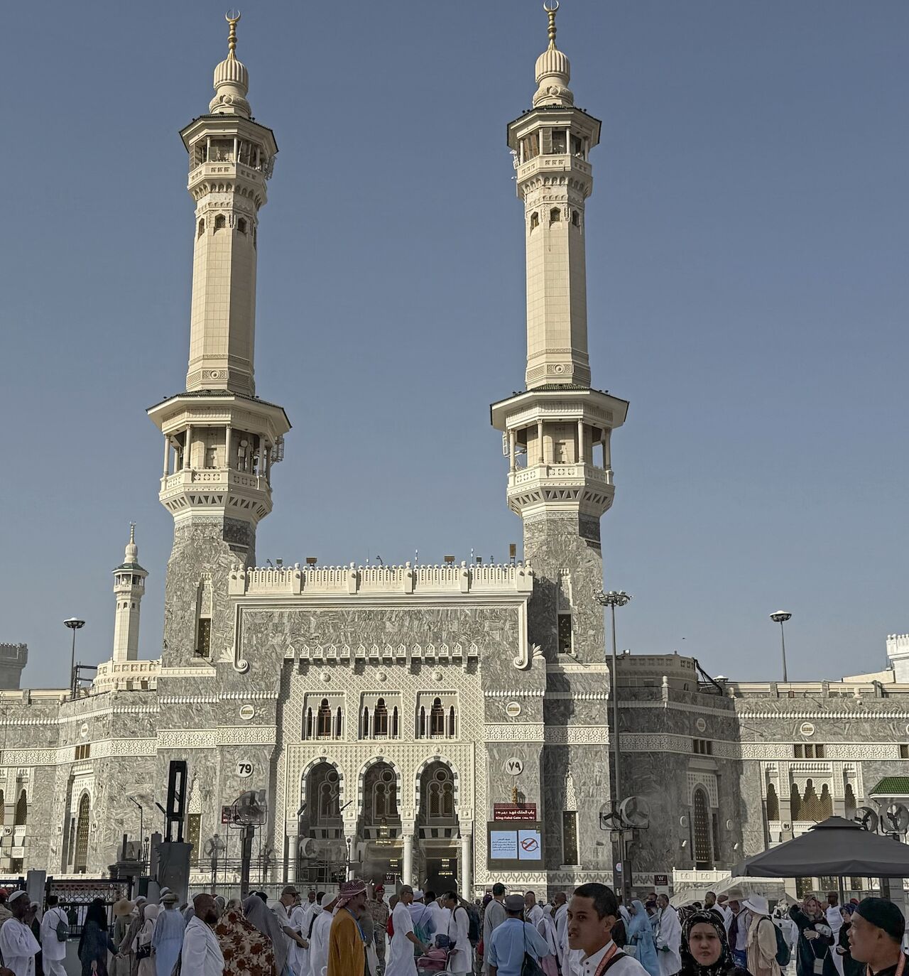 Muslim worshippers walk along the Grand Mosque complex in the holy city of Mecca on May 22, 2026, ahead of the annual Hajj pilgrimage. 