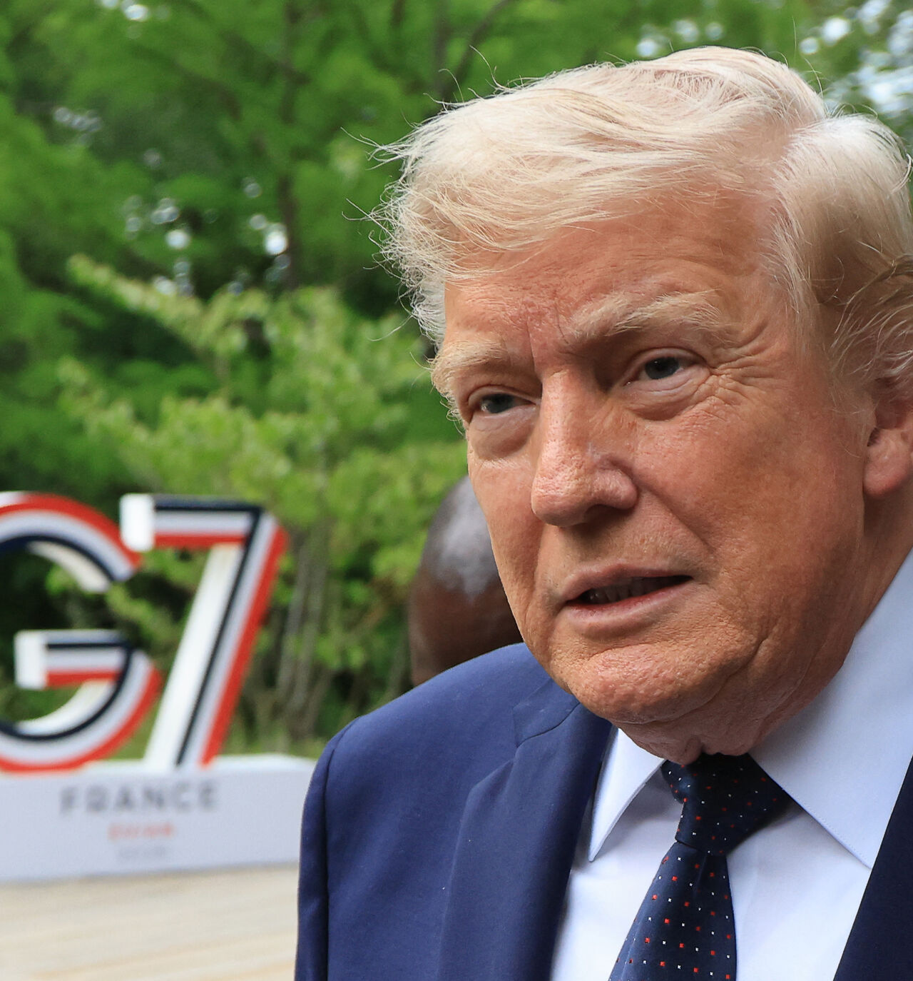 US President Donald Trump arrives to attend a musical interlude before a gala dinner as part of the G7 summit, in Evian, eastern France, on June 16, 2026. 