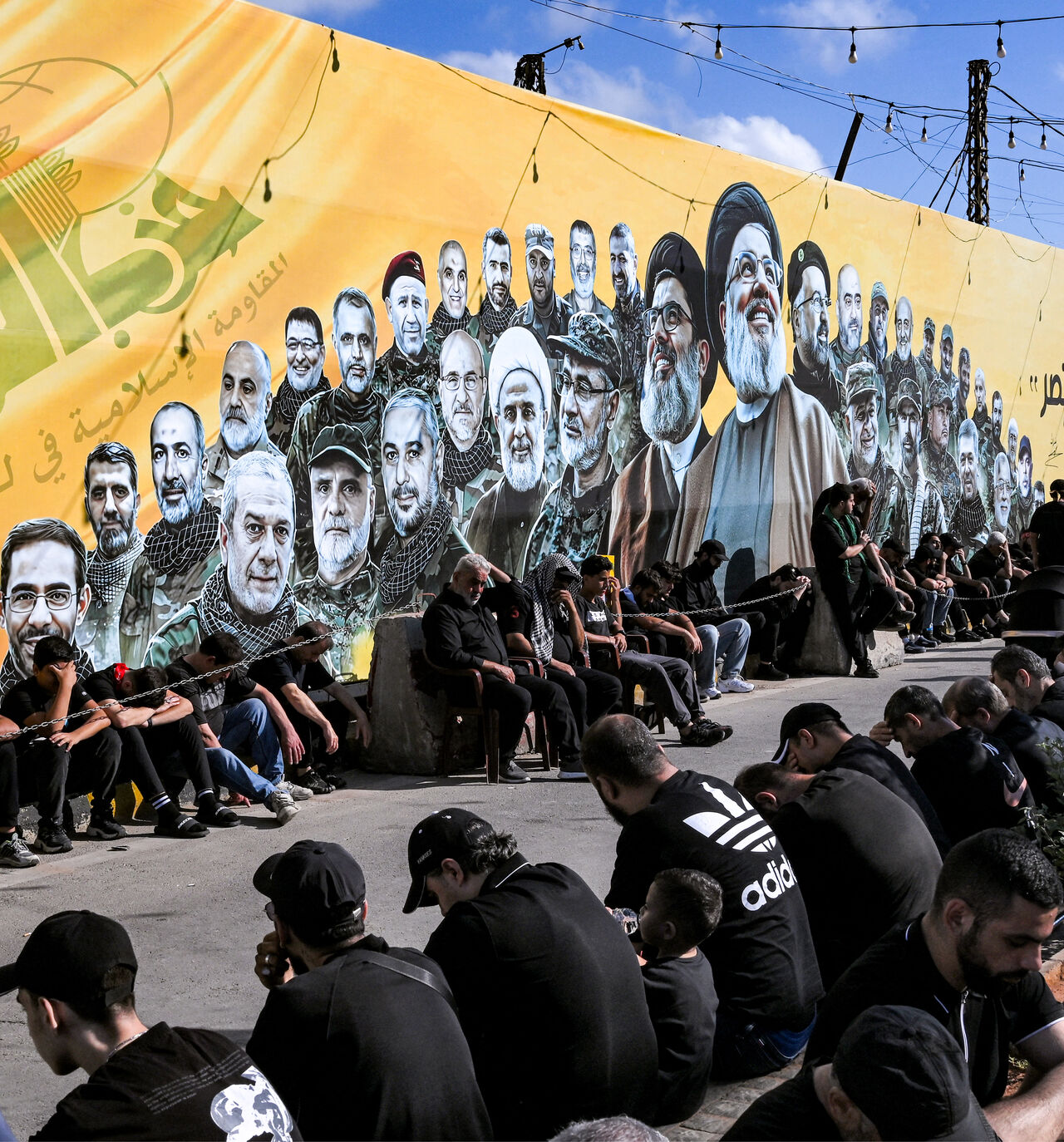 Shia Muslim devotees gather for a mourning ritual near the shrine of Hassan Nasrallah, the slain leader of the Lebanese Shia movement Hezbollah who was killed in a 2024 Israeli-airstrike, in Beirut's southern suburbs on June 26, 2026 at the peak of Ashura, a 10-day period commemorating the seventh century killing of Prophet Mohammed's grandson Imam Hussein. (Photo by JOSEPH EID / AFP via Getty Images)