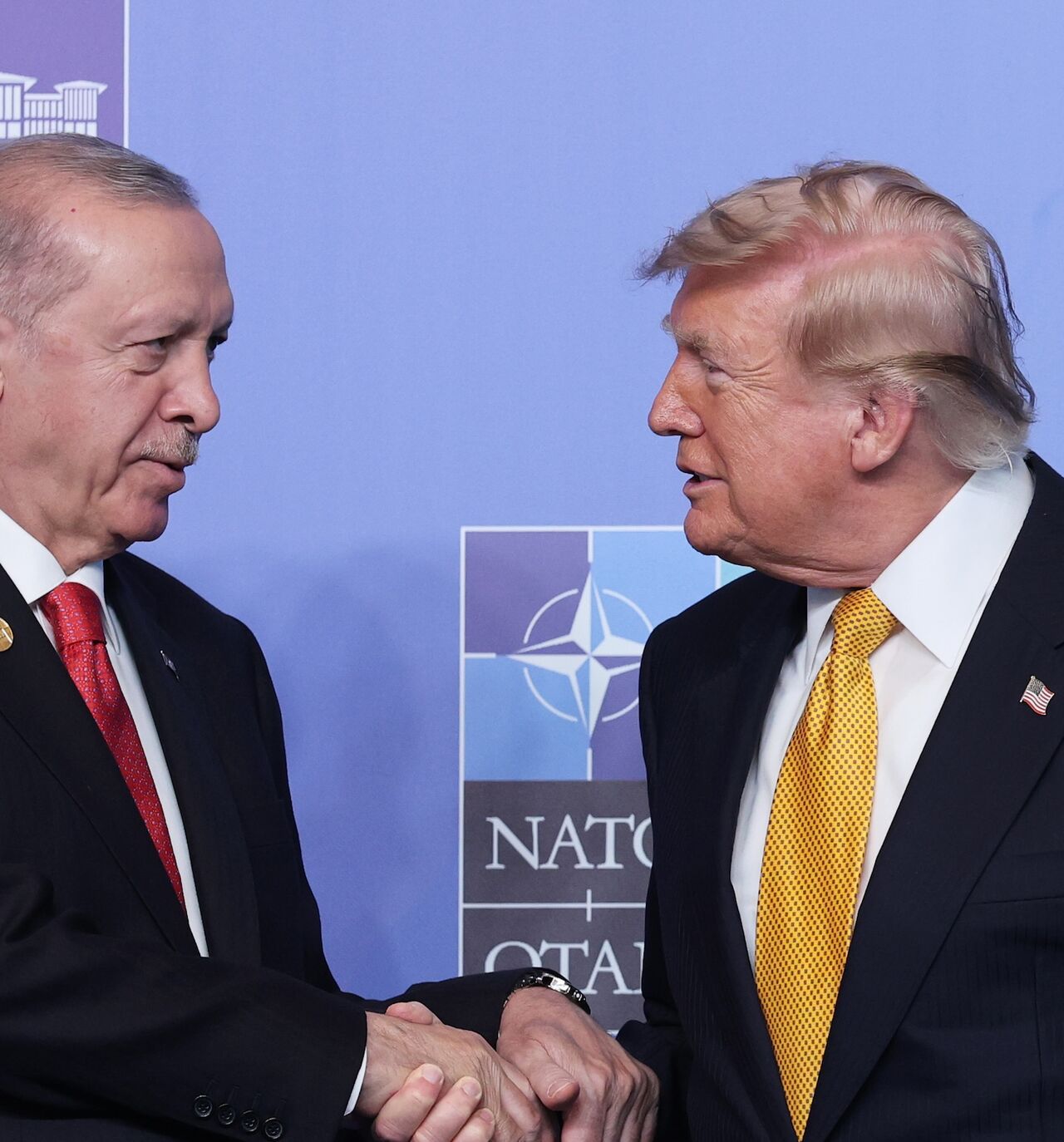 Recep Tayyip Erdogan, president of Turkey, greets Donald Trump, president of United States, during a welcome ceremony of allied heads of state and government, on July 8, 2026, in Ankara, Turkey.