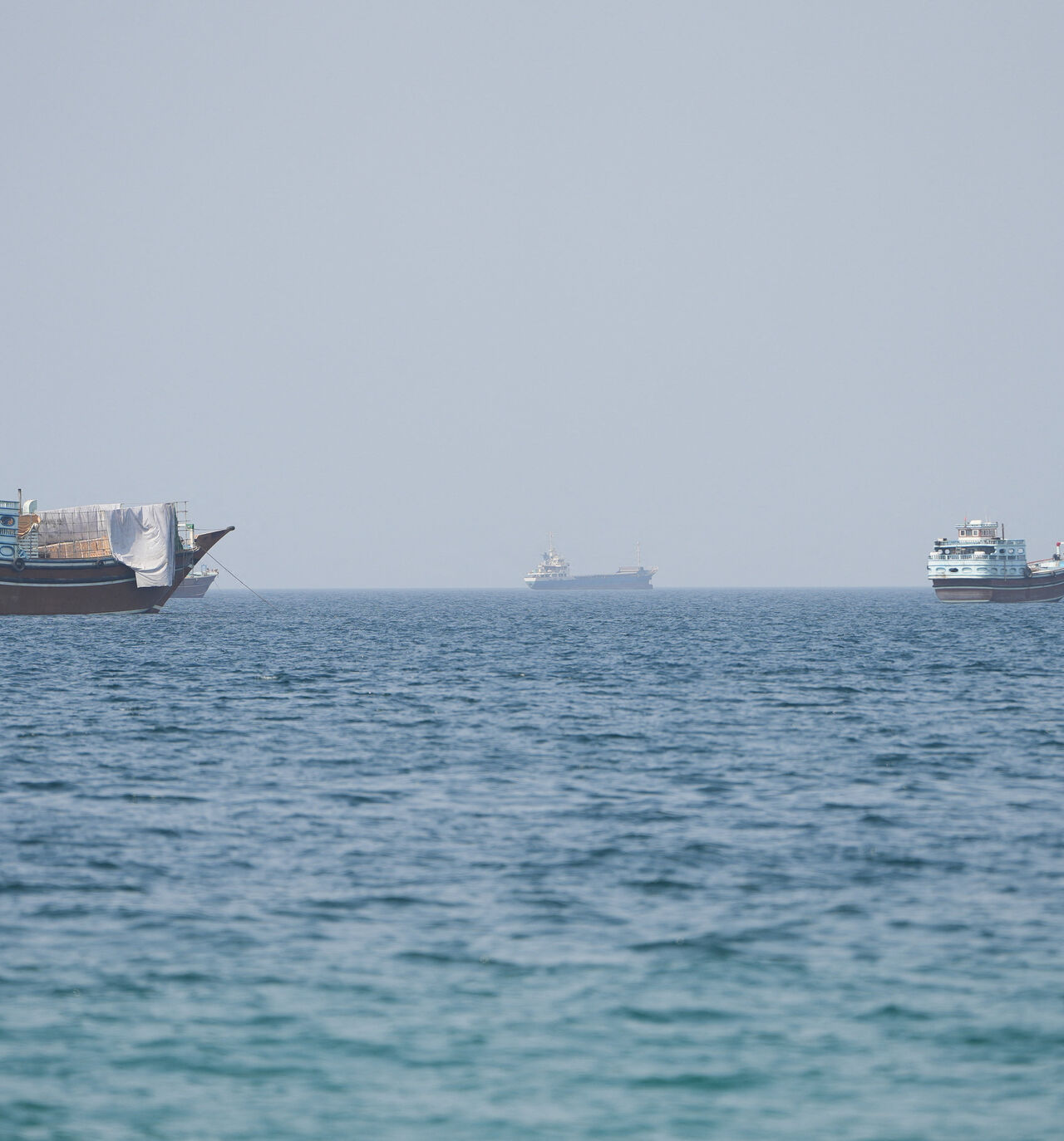 Vessels near the Strait of Hormuz, as seen from Musandam, Oman, August 6, 2026. REUTERS/Stringer