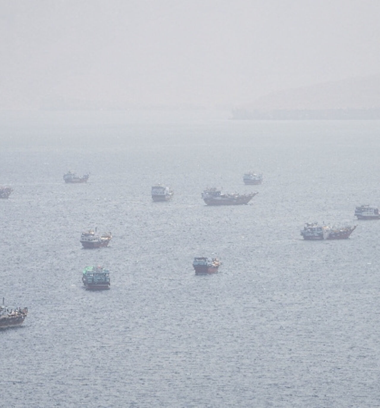 FILE PHOTO: Vessels near the Strait of Hormuz, as seen from Musandam