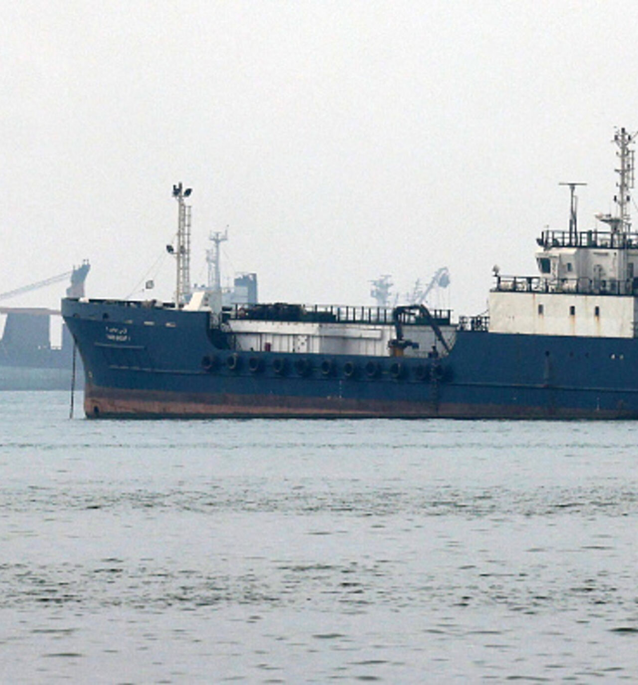 Vessels transit the Hormuz Strait off the coast of Iran's southern port city of Bandar Abbas on September 7, 2026. Iran's top negotiator threatened on September 6 of a more forceful response to any further US attacks after Tehran targeted American warships in their latest round of clashes. The exchanges of fire, which began with US raids last week, come amid a deadlock in the six-month war between the two foes. (Photo by ATTA KENARE / AFP via Getty Images) /