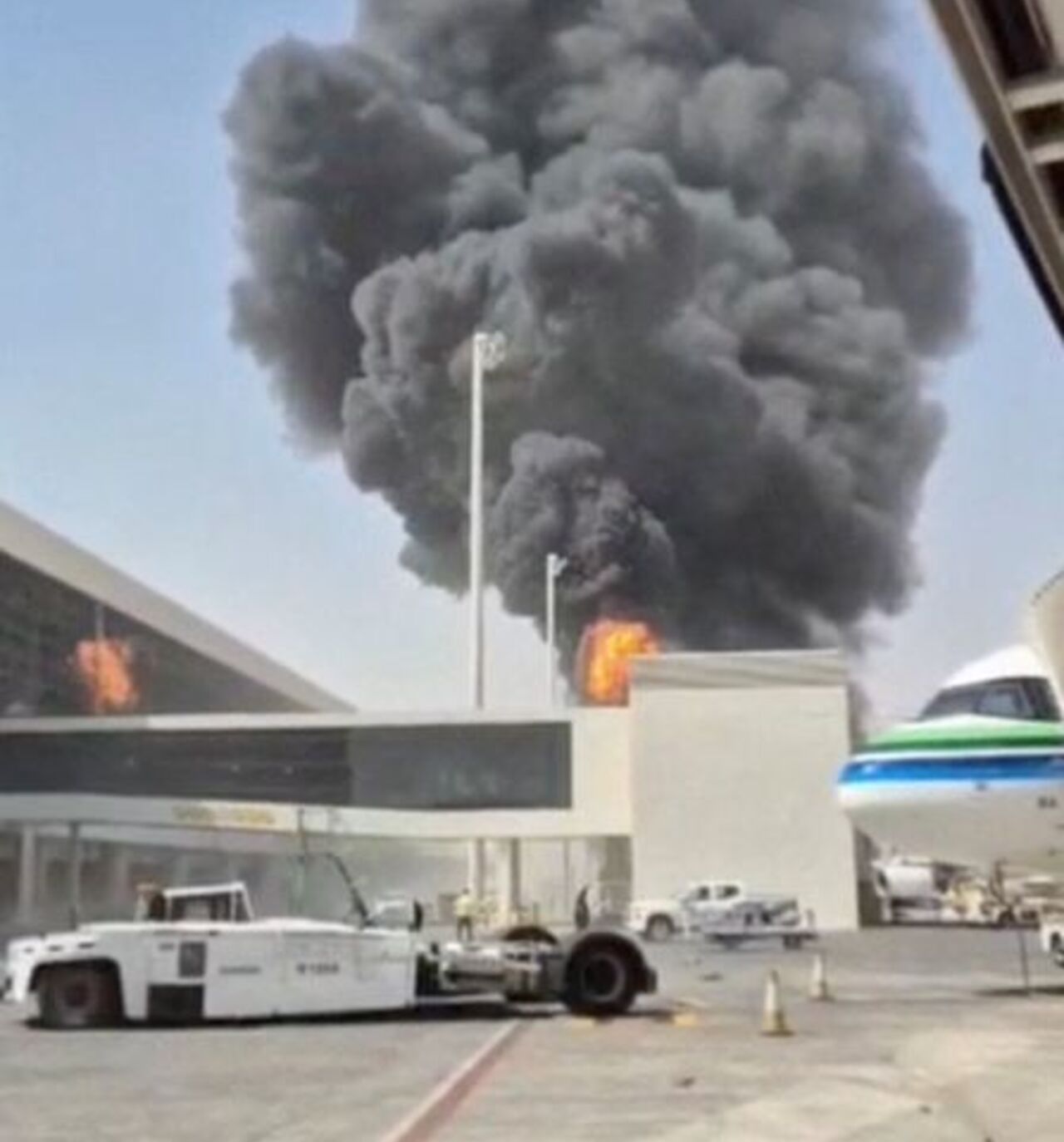 Smoke and flames rise from King Khalid Airport, after Yemen’s Iran-backed Houthis said they attacked the airport, in Riyadh