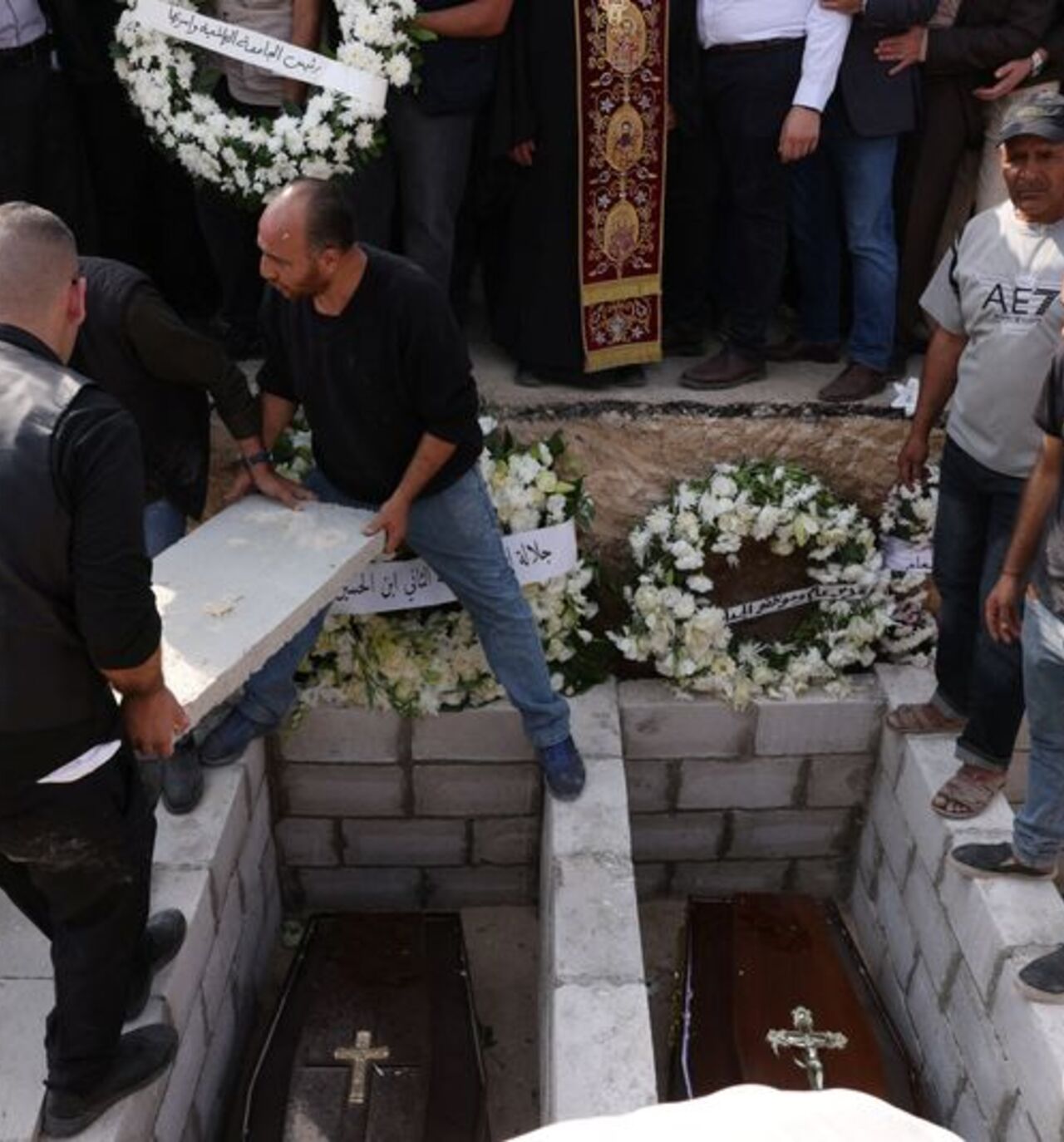 Funeral for victims of a church shooting in Karak
