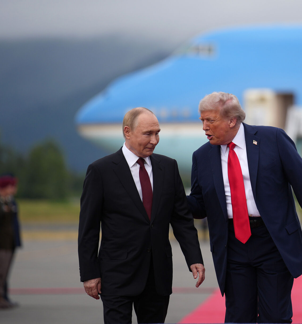 ANCHORAGE, ALASKA - AUGUST 15: U.S. President Donald Trump (R) walks with Russian President Vladimir Putin as they arrives at Joint Base Elmendorf-Richardson on August 15, 2025 in Anchorage, Alaska. The two leaders are meeting for peace talks aimed at ending the war in Ukraine. (Photo by Andrew Harnik/Getty Images)