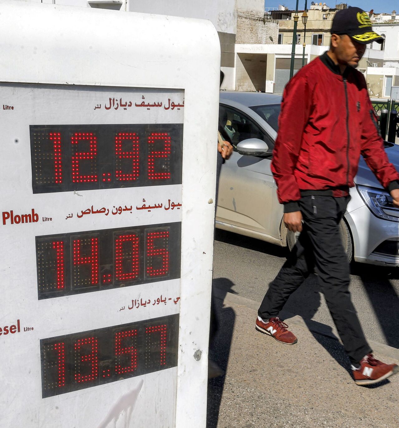 Fuel prices are displayed at a petrol station in Rabat