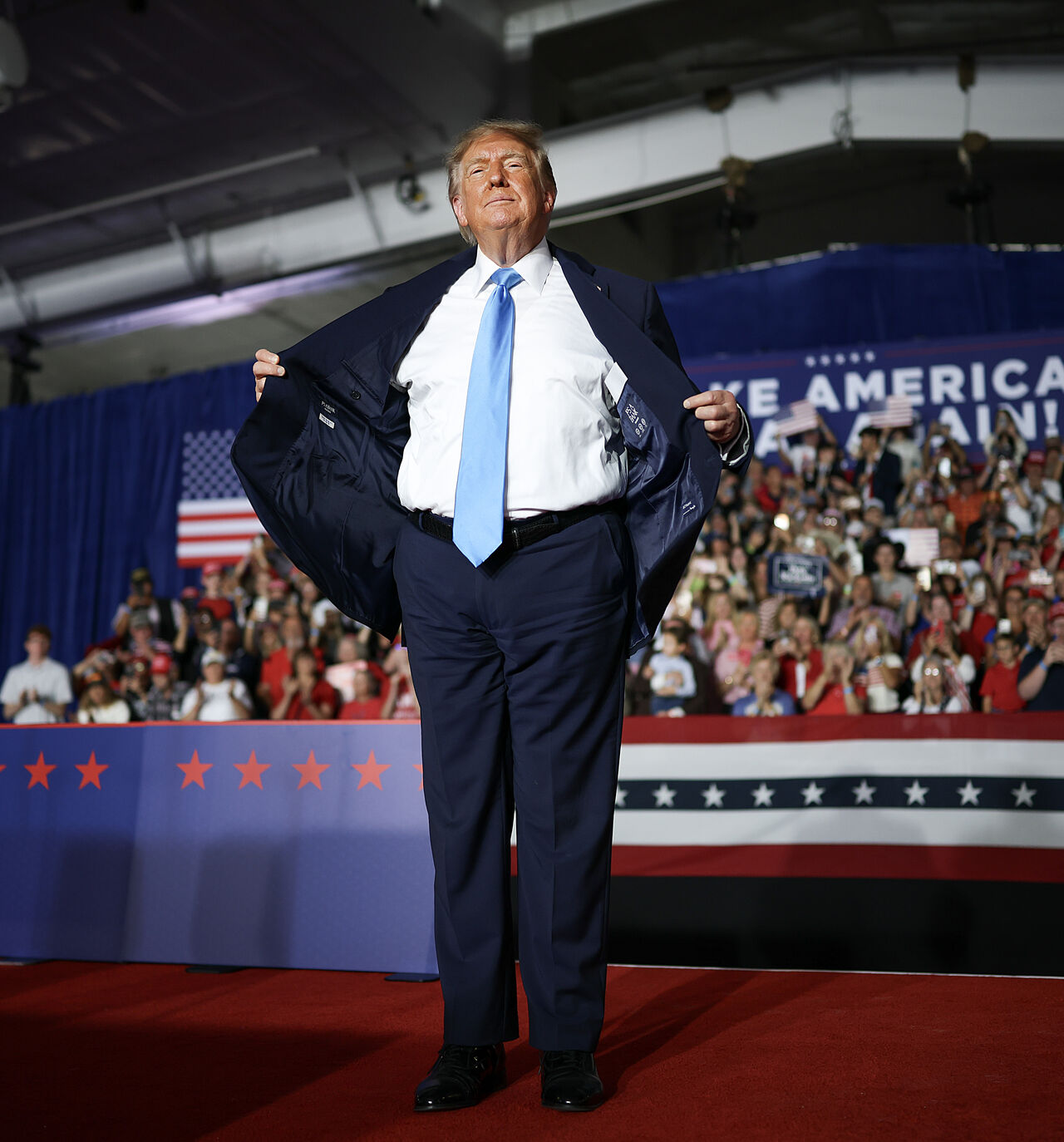 GRAND ISLAND, NEBRASKA - OCTOBER 05: U.S. President Donald Trump wraps up an appearance at a campaign rally at Pinnacle Bank Expo Center on the Nebraska State Fairgrounds on October 05, 2026 in Grand Island, Nebraska. Trump is campaigning for incumbent U.S. Sen. Pete Ricketts (R-NE) and Gov. Jim Pillen ahead of the November midterm elections. (Photo by Win McNamee/Getty Images)