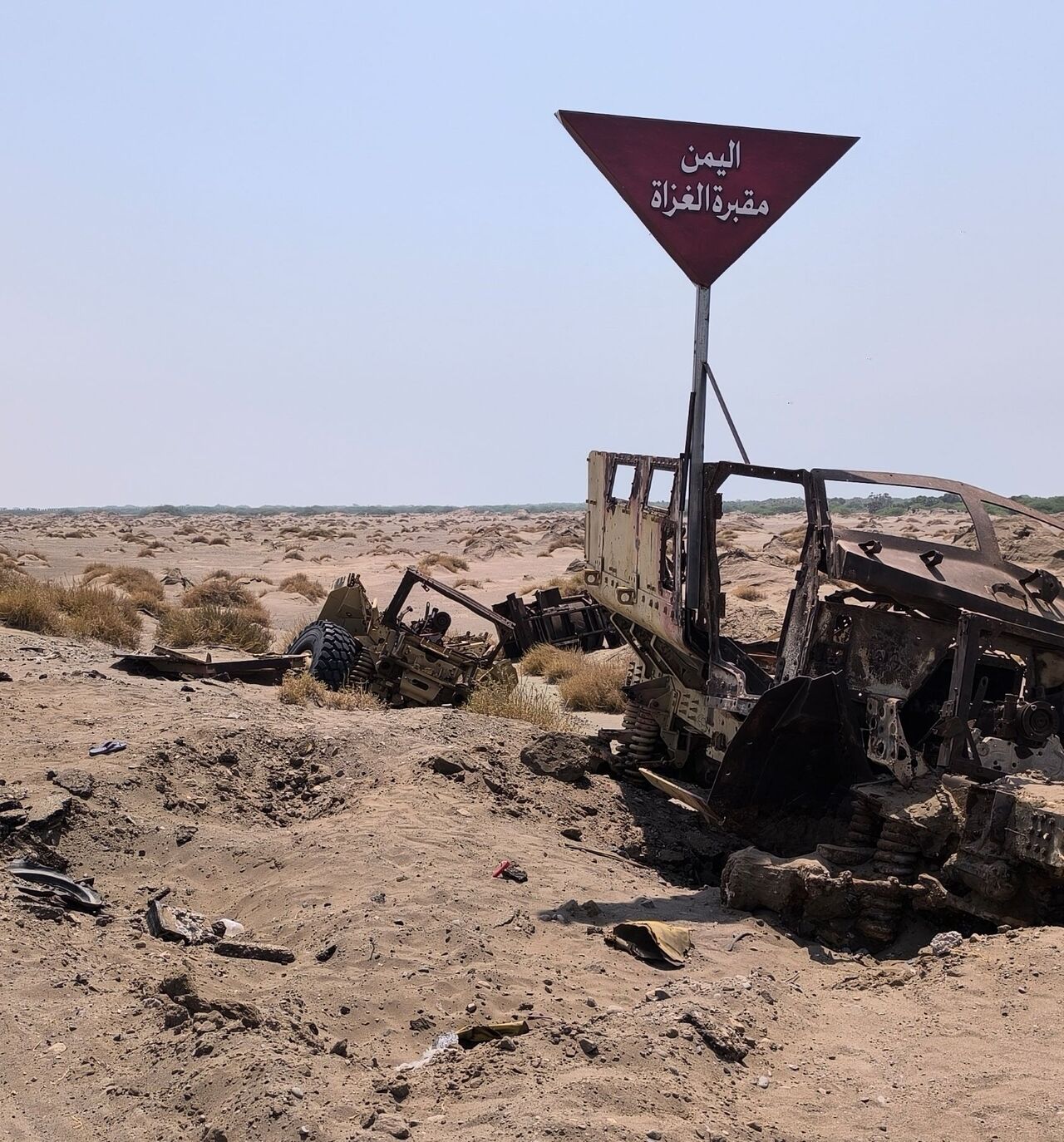 Destroyed military vehicles reportedly belonging to Saudi-backed forces