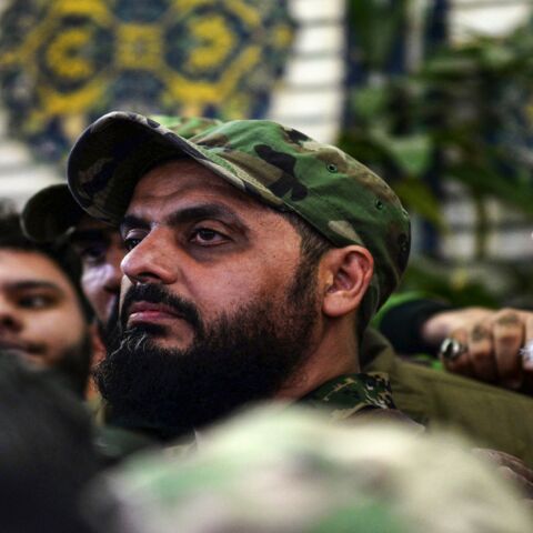 Qais al-Khazali (C) commander of the Asaib Ahl al-Haq pro-Iran faction attends the funeral procession of slain Iraqi paramilitary chief Abu Mahdi al-Muhandis, Iranian military commander Qasem Soleimani and eight others at the Imam Ali Shrine in the shrine city of Najaf in central Iraq on Jan. 4, 2020. 