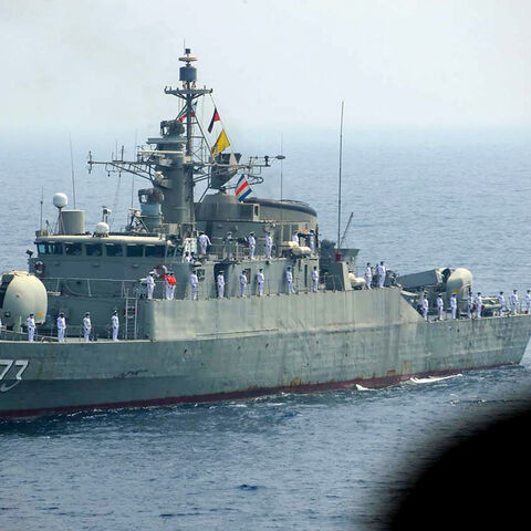 A handout photo provided by the Iranian army official website shows an Iranian naval ship parading during the last day of a military exercise in the Gulf, near the strategic Strait of Hormuz, southern Iran, Sept. 12, 2020.