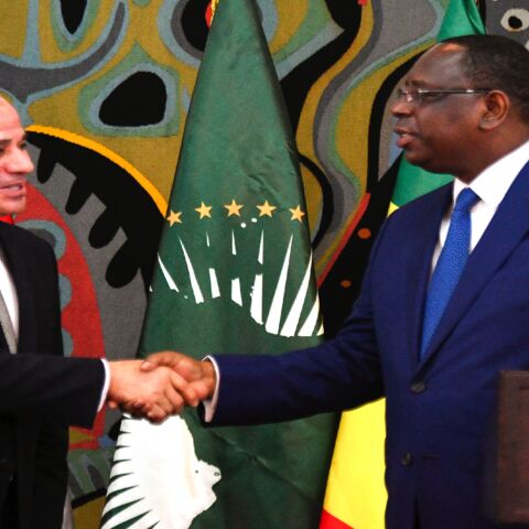 Egypt's President and current Chairperson of the African Union, Abdel Fattah al-Sisi (L), takes part in a joint press conference with Senegalese President Macky Sall at the Presidential Palace in Dakar for an official visit on April 12, 2019.