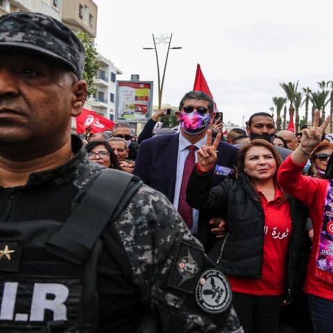 A member of Tunisia's special forces' national brigade for rapid intervention (BNIR) marches on duty ahead of the leader of the Free Destourian Party, Abir Moussi (2nd-R).