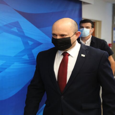 Israel's Prime Minister Naftali Bennett arrives for the weekly Cabinet meeting in Jerusalem on Aug. 1, 2021.